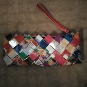 Candy wrapper wristlet red strap. Like new